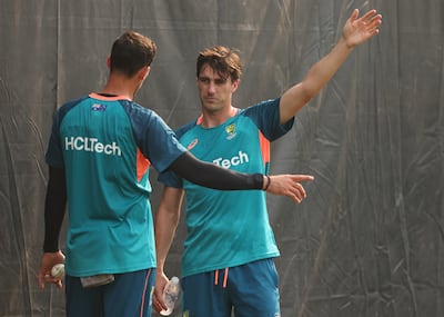 Pat Cummins speaks to Mitchell Starc during Australia's training session at the MA Chidambaram Stadium in Chennai. Getty