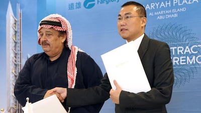 Adel Saleh, the executive chairman of Al Fara’a and Jack Hu, the managing director of Farglory Middle East. Ravindranath K / The National