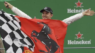 Mercedes driver Nico Rosberg celebrates after winning the Formula One Italian Grand Prix. Luca Bruno / AP Photo