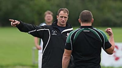 Mike Catt, left, is getting increasingly comfortable in his role as a coach.