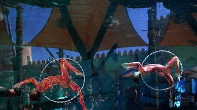 Dancers perform in an underwater show at Yas Waterworld in Abu Dhabi. Ravindranath K / The National