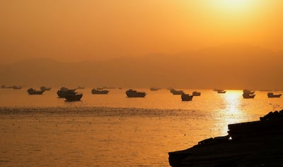 Ships in the Strait of Hormuz, as seen from Musandam, Oman. Reuters