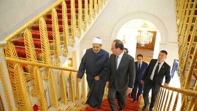French president Francois Hollande with Egypt’s Grand Imam of Al Azhar Mosque, Ahmed El Tayyeb, in Paris. Dr El Tayyeb was recently received by Pope Francis. Courtesy The Muslim Council of Elders
