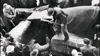 Residents of Budapest destroy a huge statue of Joseph Stalin during the Hungarian Revolution of 1956. AFP