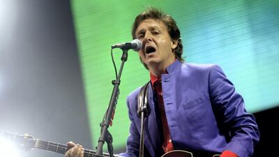 Paul McCartney performs on the Pyramid stage at the 2004 Glastonbury Festival. Getty Images