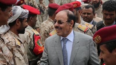 Yemen's vice president Ali Muhssien Al Ahmar (C) shakes hands with army officers as he visits a military barracks in the country's central province of Marib on August 15, 2016. Reuters