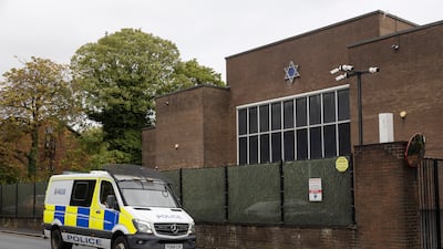 A police car patrols the area around Heaton Park synagogue. Getty Images
