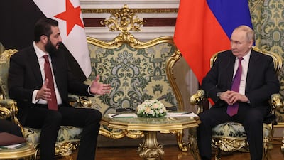 Russian President Vladimir Putin and Syrian President Ahmad Al Shara at the Kremlin in Moscow on Wednesday. AFP