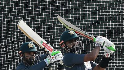 Pakistan's Mohammad Rizwan, left, and captain Babar Azam during training in Lahore for the T20 World Cup. AFP