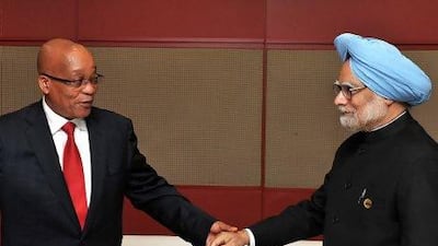 Mr Singh with South Africa's then president Jacob Zuma before the official opening of the fifth Brics summit in Durban, in 2013.