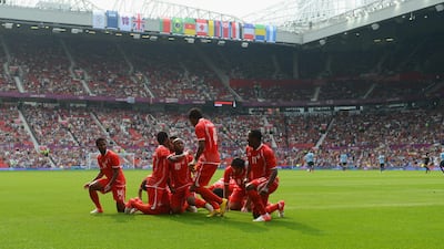 UAE players celebrate a goal by Ismail Matar to make it 1-0 during the Men's Football first round Group A Match of the London 2012 Olympic Games against Uruguay, at Old Trafford in Manchester, England. Getty Images