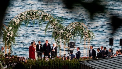 Arsenal's German midfielder Mesut Ozil and his fiance Amine Gulse stand next to Turkish President Recep Tayyip Erdogan and his wife Emine Erdogan during their wedding ceremony at the Four Seasons Bosphorus Hotel in Istanbul, Turkey. AFP