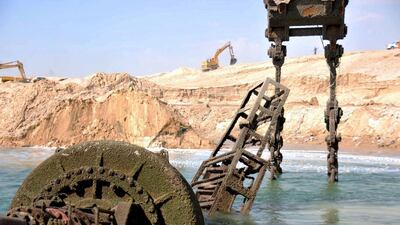 Work on the New Suez Canal continues. Courtesy NMDC