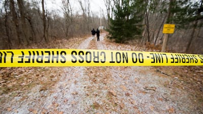 Investigators from the Ohio Bureau of Criminal Investigation walk to the spot where Emirati student Saif Nasser Mubarak Al Ameri, 26, was killed by a police officer on December 4, 2016. Ken Blaze