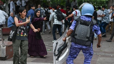 Riot police and protesters clash at a demonstration organised by the Cockroach Janata Party in New Delhi on July 20, 2026. Getty Images