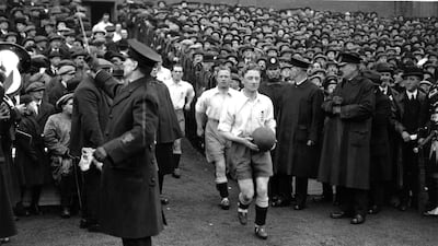 The England national football team captain, George Wilson, leads his side out to face Scotland in Glasgow in April 1923. England will compete in its 1,000th international against Montenegro on November 14, 2019. Photo by Topical Press Agency / Getty Images