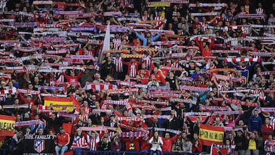 Atletico Madrid fans cheer on their team during the Primera Liga match against Granada at Vicente Calderon on October 15, 2016 in Madrid, Spain. Atletico won the match 7-1. Denis Doyle / Getty Images