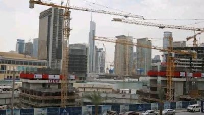 During the boom years, it was widely believed that 25 per cent of the world's construction cranes were in Dubai. Randi Sokoloff / The National