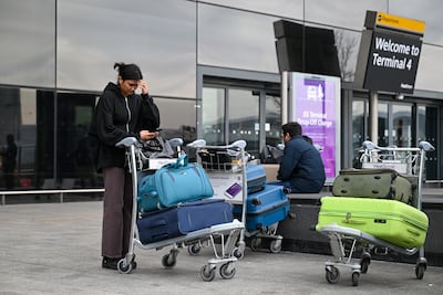 Airlines were telling passengers to await updates on new flight schedules. Bloomberg