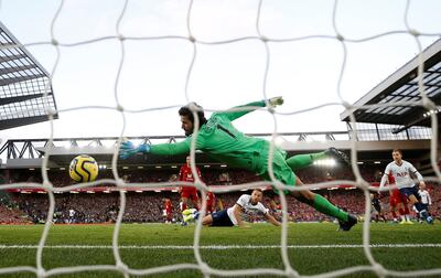Tottenham's Harry Kane scores his team's first goal. Reuters
