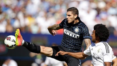Mauro Icardi scored Inter Milan's penalty equaliers and later converted the winning spot kick in the shootout after Inter and Real Madrid drew 1-1 at the International Champions Cup on Saturday in Berkeley, California. Ezra Shaw / Getty Images / AFP / July 26, 2014