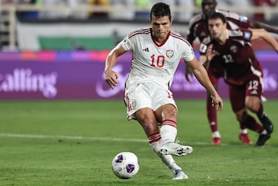 Fabio De Lima scores from the penalty spot in the UAE's 5-0 World Cup qualifying win over Qatar on November 19, 2024. AFP