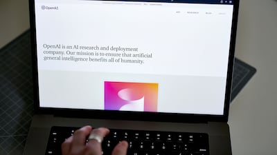 The OpenAI website on a laptop. If asked, ChatGPT can create essays, poems and coding. Bloomberg