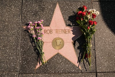 Flowers left on the Walk of Fame star for Rob Reiner in Hollywood, Los Angeles. AP