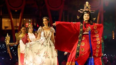 Performers walk on stage during the China pavilion day at the Dubai Expo 2020 in January 2022. AFP