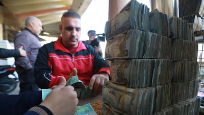 A foreign currency exchange business in Baghdad, Iraq. Anadolu Agency via Getty Images