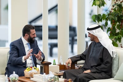 President Sheikh Mohamed with Ahmad Al Shara in Abu Dhabi on April 22. Reuters