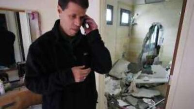 Aryeh Lazar from Kibbutz Tequma, near the Gaza Strip, had a rocket hit his home and land in his bathtub.