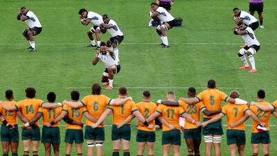 Fiji players perform the Cibi prior to the Rugby World Cup France 2023 match against Australia at Stade Geoffroy-Guichard in Saint-Etienne. Getty Images