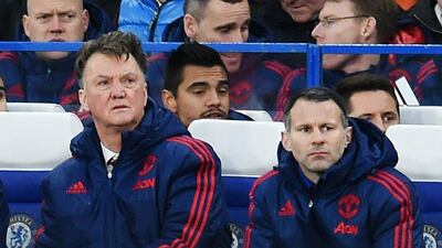Manchester United manager Louis Van Gaal with assistant Ryan Giggs observes his side during their match against Chelsea on Sunday. Andy Rain / EPA / February 7, 2016
