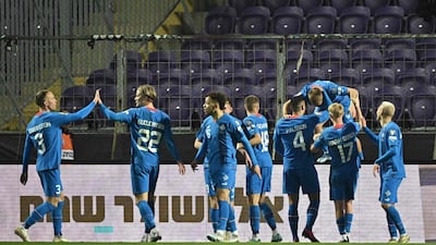 Iceland players celebrate a goal during the Euro 2024 qualifier play-off semi-final against Israel. AFP