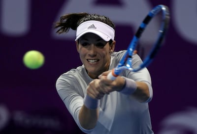 Garbine Muguruza takes on Cici Bellis in Dubai. Ibraheem Al Omari / Reuters