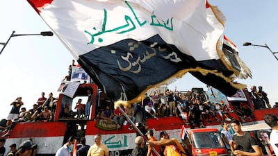 Iraqi demonstrators gather to mark the first anniversary of the anti-government protests in Baghdad, Iraq. Reuters