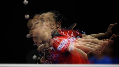 A multiple exposure picture shows Mima Ito of Japan competing against Yuting Gu of China during the women's singles at the International Table Tennis Federation, World Tour Platinum Korean Open in Daejeon, South Korea. Jeon Heon-Kyun / EPA