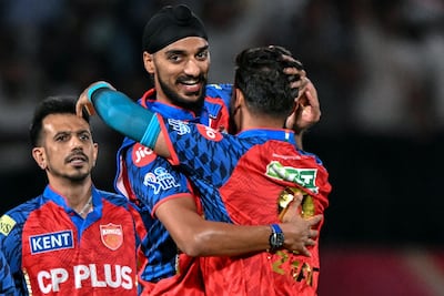 Punjab Kings' Arshdeep Singh, centre, has kicked up a storm by commenting on his national teammate's skin colour. AFP