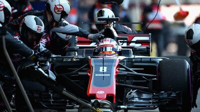 Romain Grosjean is shown in the the Haas F1 Team Haas-Ferrari VF-17 Ferrari during a pit stop during the final day of Formula One winter testing at Circuit de Catalunya on March 10, 2017 in Montmelo, Spain. Charles Coates / Getty Images