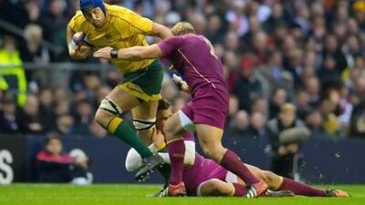 England, in purple, were beaten by Australia last week which could affect their ranking. Tom Hevezi / AP Photo