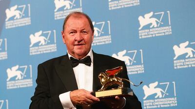 Roy Andersson with the Golden Lion Award for Best Film at the 71st Venice Film Festival. Vittorio Zunino Celotto / Getty Images
