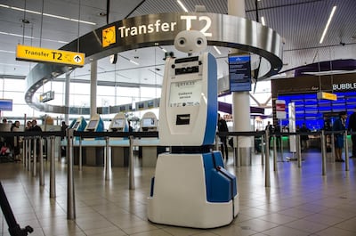 KLM has tested robot assistants at Schipol Airport in Amsterdam. In the future, airport assistants may be virtual. Courtesy KLM