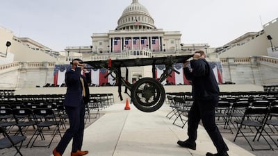 Workers prepare for the inauguration of US president-elect Donald Trump at the US Capitol in Washington, DC, on January 19, 2017. Brian Snyder / Reuters