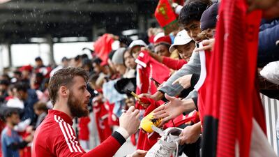 David de Gea of Manchester United signs autographs. Getty Images
