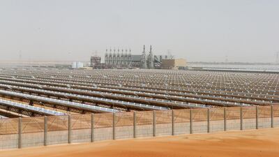 Above, the Shams 1 concentrated solar power in the Western Region of Abu Dhabi. The emirate is currently seeking consultations for solar rooftop regulations. Christopher Pike / The National