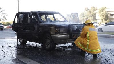 Fire gutted a four-wheel drive in Sharjah. Jeffrey E Biteng / The National