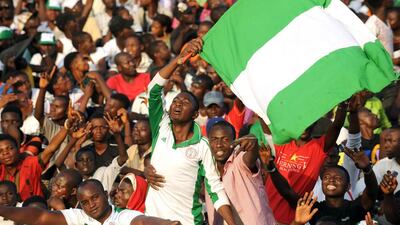 Nigerian supporters celebrate a goal against Egypt during the African Cup of Nations qualification match between Egypt and Nigeria, on March 25, 2016, in Kaduna. AFP / PIUS UTOMI EKPEI
