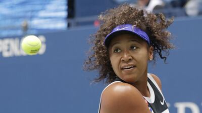 Naomi Osaka hits a return to Victoria Azarenka during the US Open final. EPA