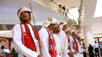 Omanis perform traditional dances at Qurum city centre mall in Muscat to mark the country's 44th annual National Day. Justin Vela / The National